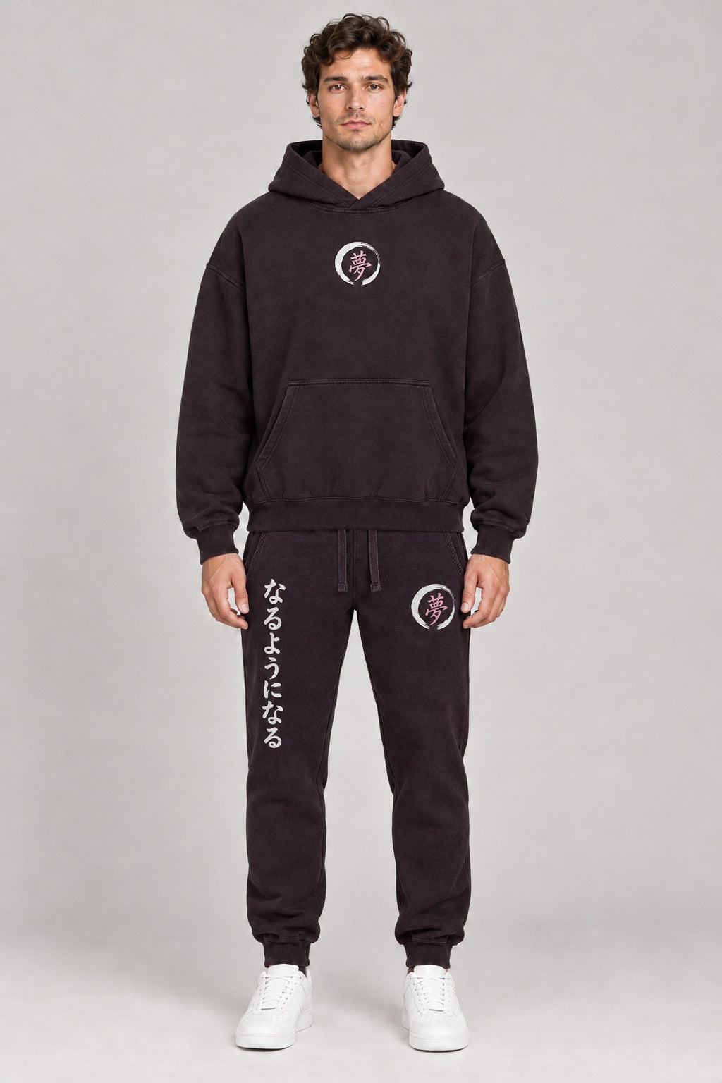 Model wearing the Things Become mulberry hoodie with matching mulberry joggers, front
