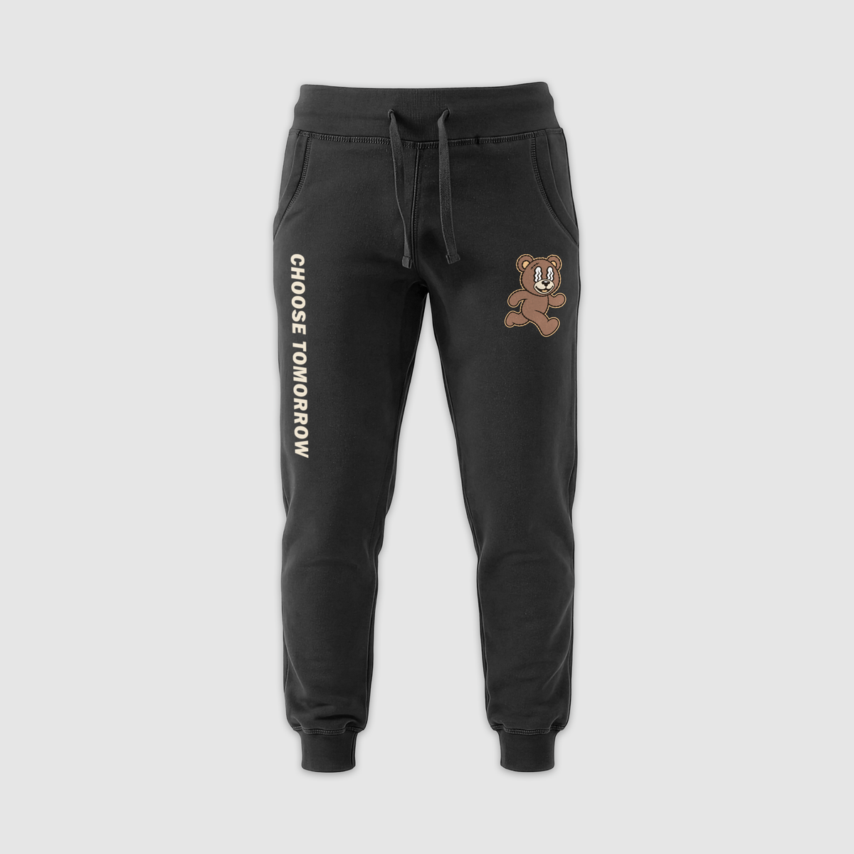 Choose Tomorrow black joggers with Somni running bear and leg text
